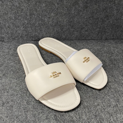 COACH LOCKUP LEATHER SLIDE SANDAL