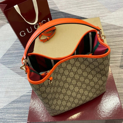 MEDIUM GG EMBLEM BUCKET BAG GUCCI