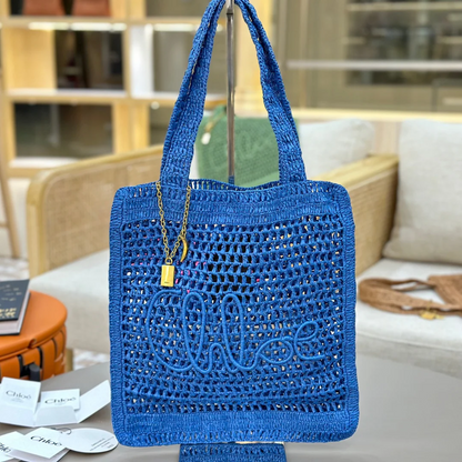 CHLOÉ SUMMER BANANA BAG IN RAFFIA